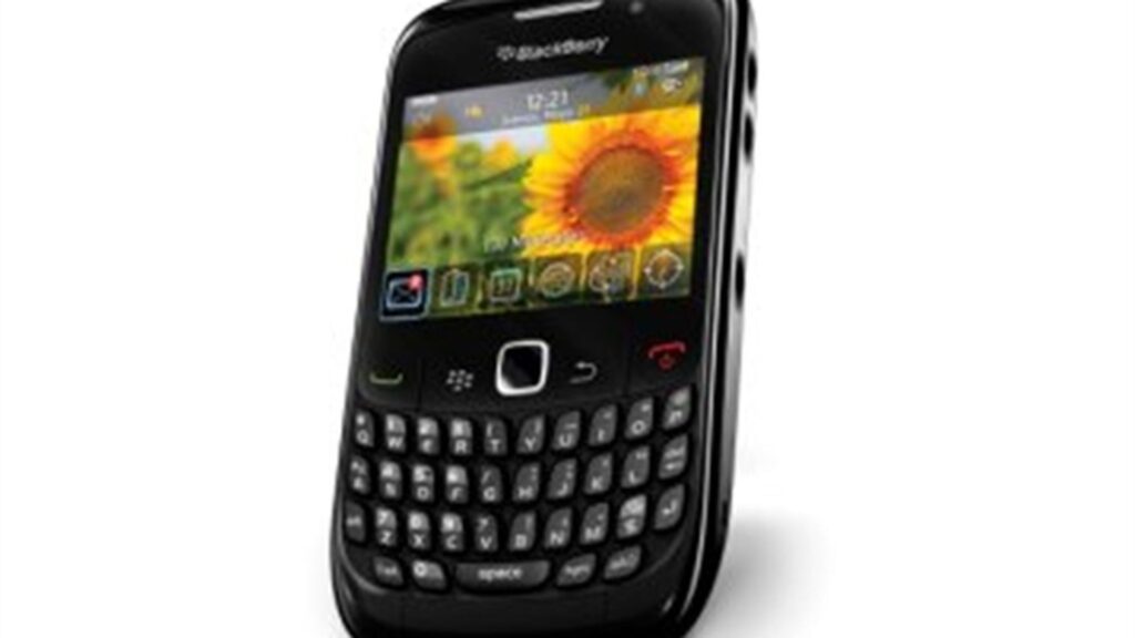 BlackBerry Curve 8520 negro con fondo de pantalla de un girasol